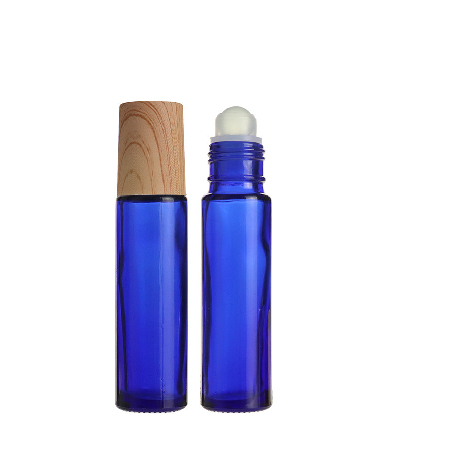 Clear Blue Glass Eaaential Oil Perfume Roller Bottle Bottle Roll Eye Cream Roller Wood Grain Cover Glass Roll on Perfume Bottle