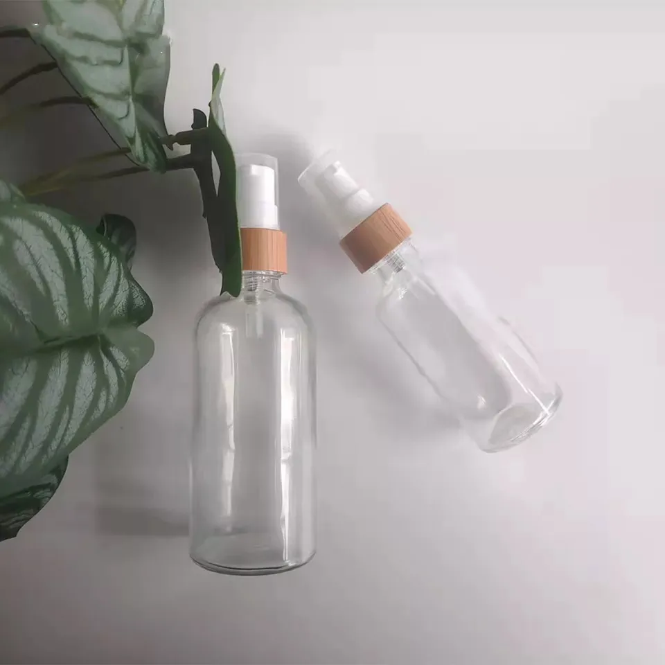 Wholesale Cylinder Lotion Pump Bottles With Bamboo Cap Empty Skincare Transparent Atomizer FineMist Glass With Bamboo Wooden Lid