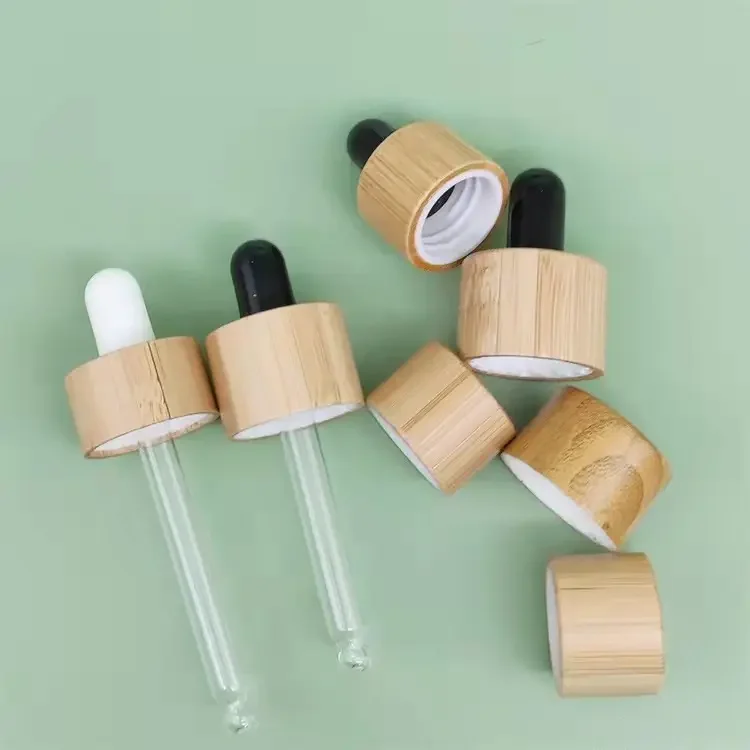 Stock and Wholesale Bamboo Packaging Coliber Bottle Bamboo Caps Wooden Cap Essential Oils Perfume Bottle Top Wooden Bamboo Cover
