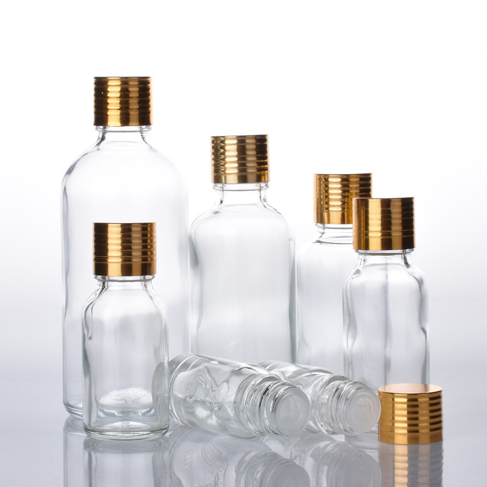 12pcs/lot 5ML 10ML 15ML 20ML 30ML 50ML 100ML Clear Boston Round Glass Essential Oil Bottle Orifice Reducer Gold Aluminum Cap