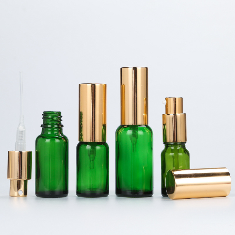 Wholesale Perfume Round Green Glass Spray Bottle Wholesale Round Clear Green Glass Spray Bottle with Golden Lid for Skin Care