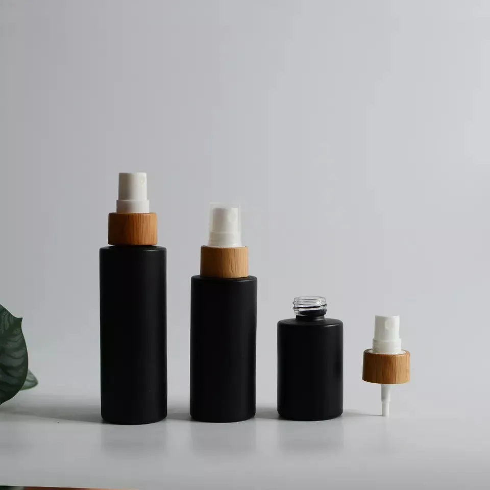 Empty Fine Mist Spray Bottle Matte Black Glass Bamboo Pump Cap Supplier Factory Eco-Friendly Material Plastic Cosmetic Skin Care